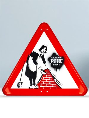 Banksy Maid Stencil on road street sign art by Josh Mahaby
